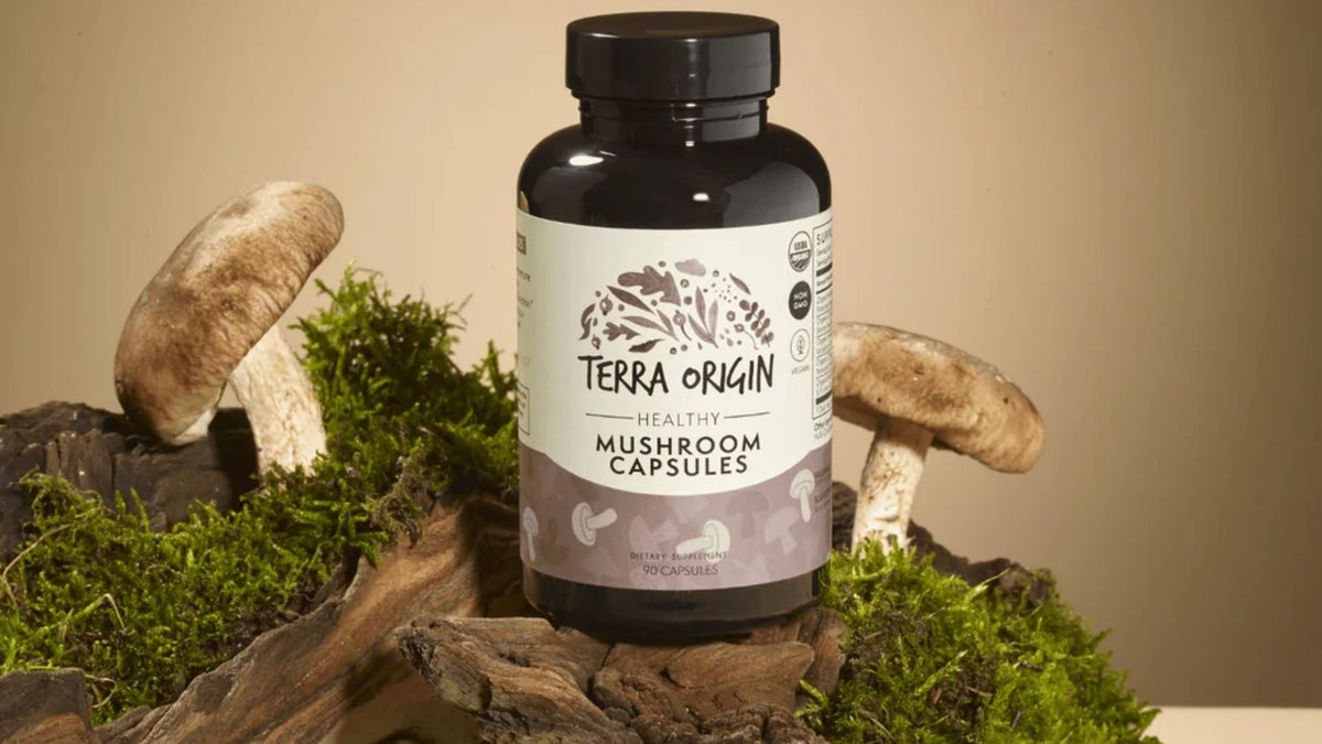 Adaptogen supplement bottle displayed on wood and moss
