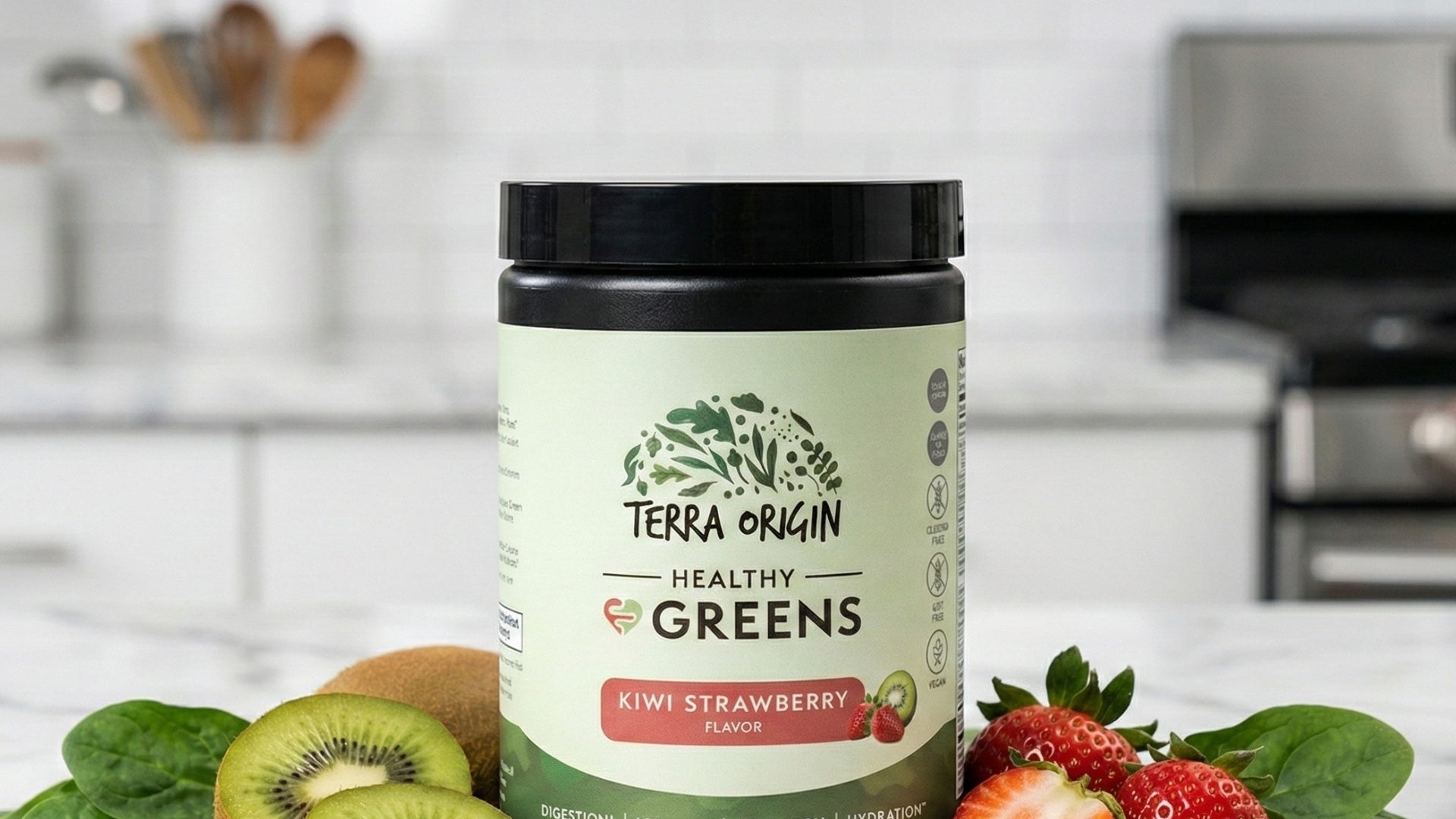 Terra Origin Healthy Greens container with fruits and vegetables on a kitchen counter